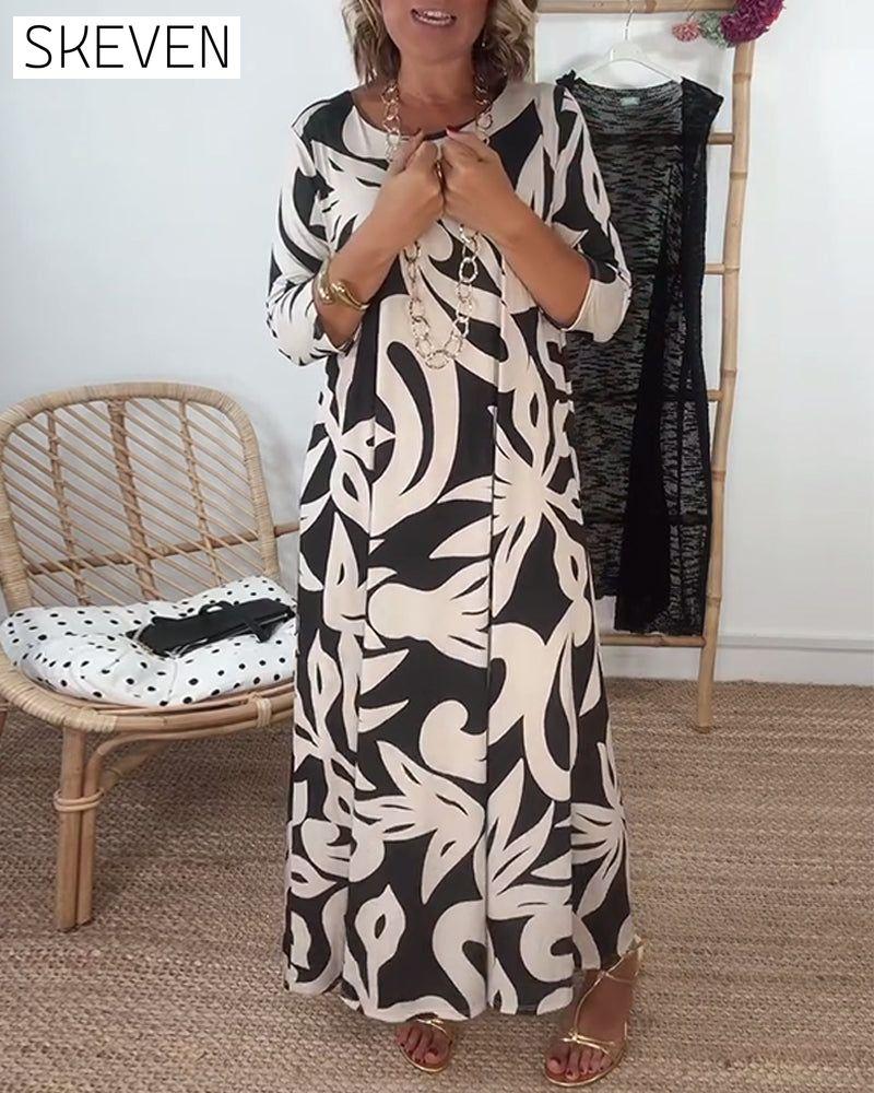 Bedrucktes Kleid mit Rundhalsausschnitt und langen Ärmeln