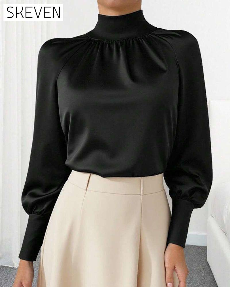 Bluse mit Laternenärmeln und hohem Kragen
