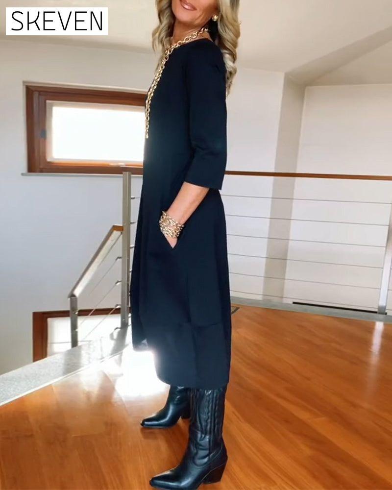 Elegantes, einfarbiges Kleid mit Rundhalsausschnitt und Taschen