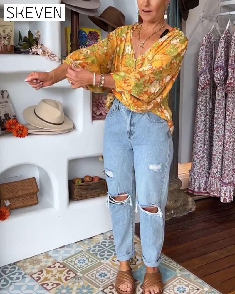 Bluse mit V-Ausschnitt und Blumenmuster