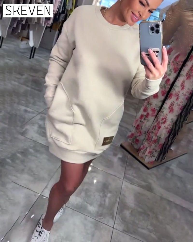 Robe pull à poches et manches longues