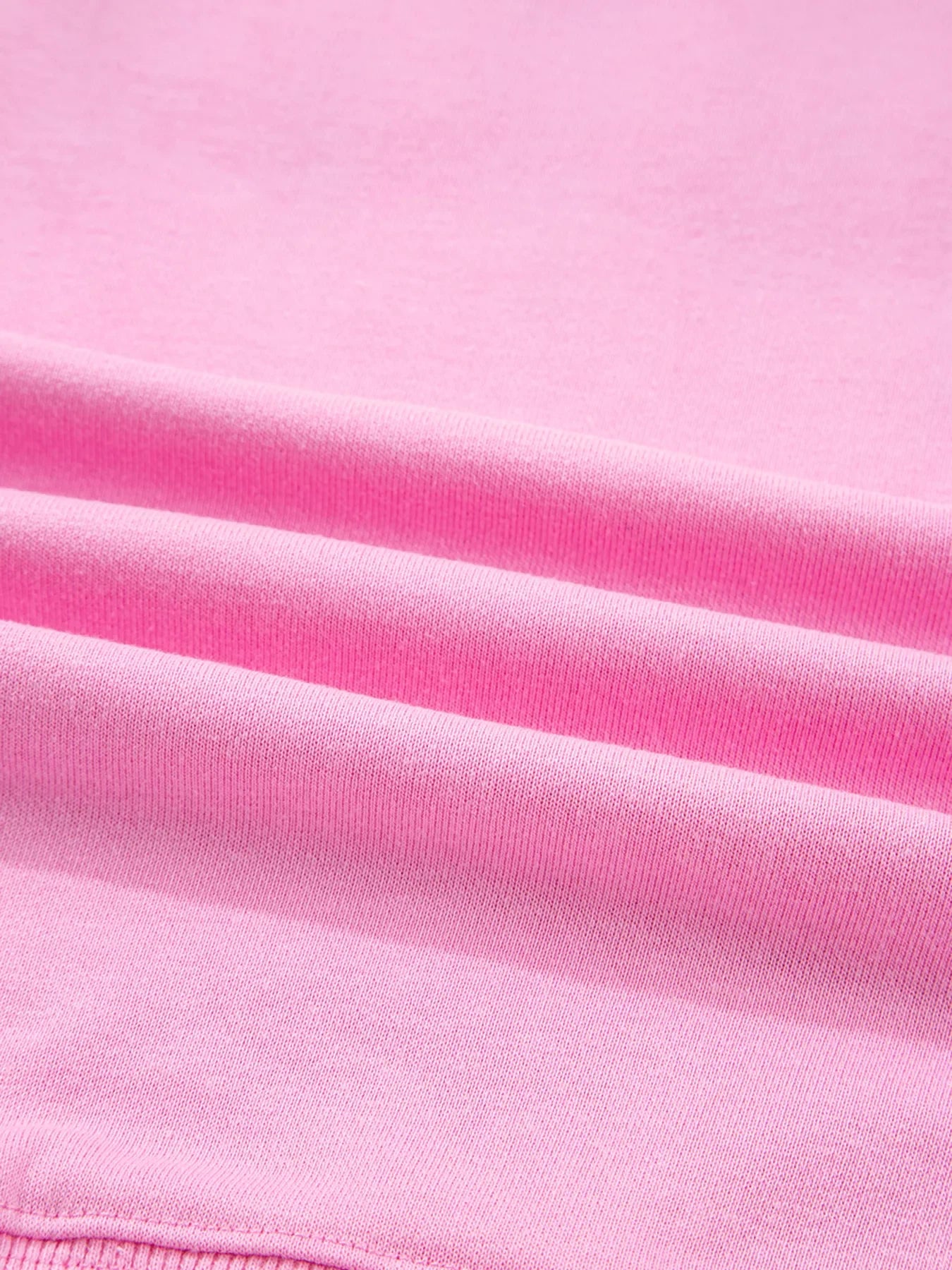 Paillettenbesetztes Sweatshirt mit XOXO-Schriftzug, sichtbaren Nähten und lockerer Passform