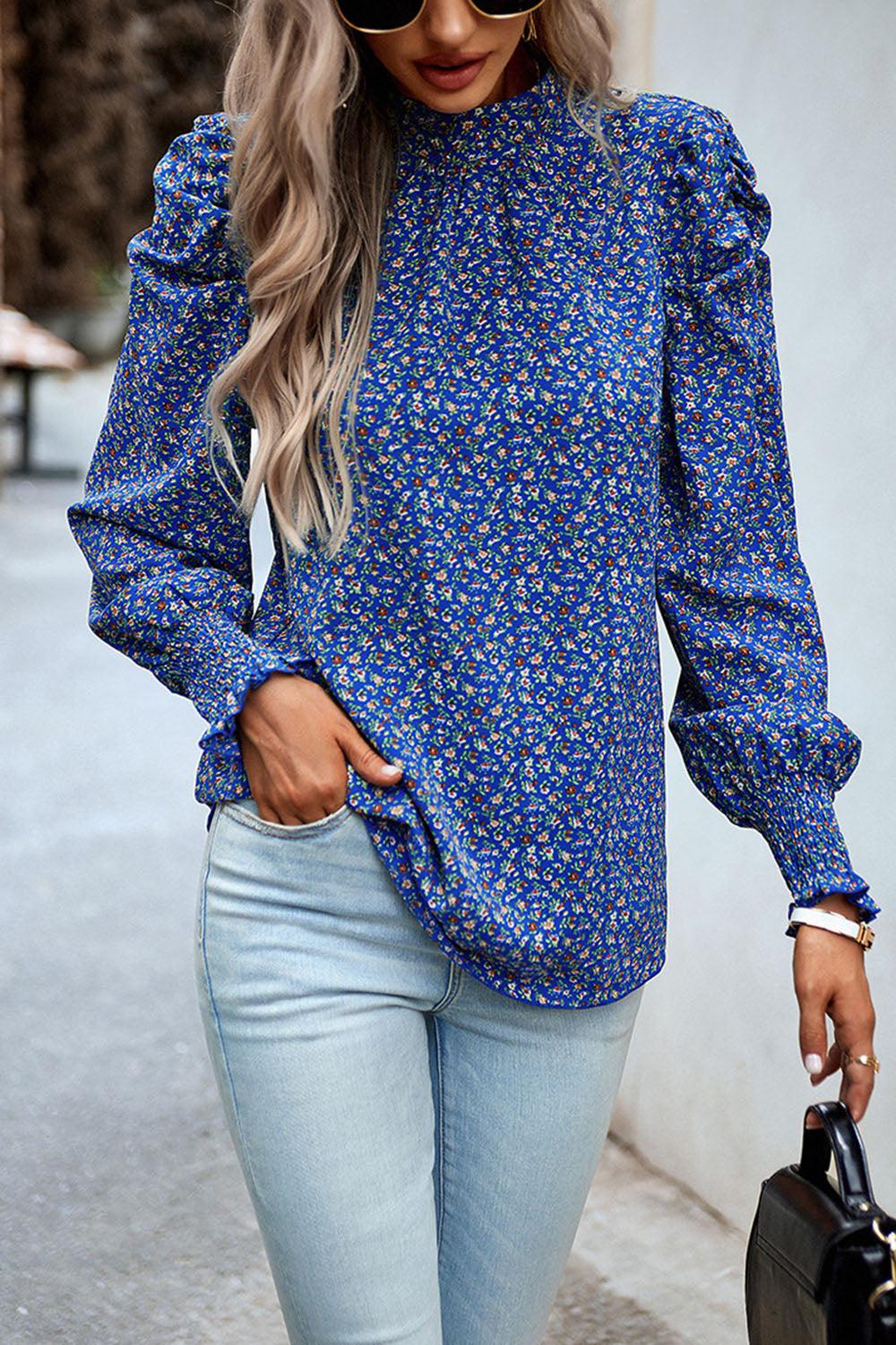 Bedruckte Bluse mit Smokdetails und Puffärmeln