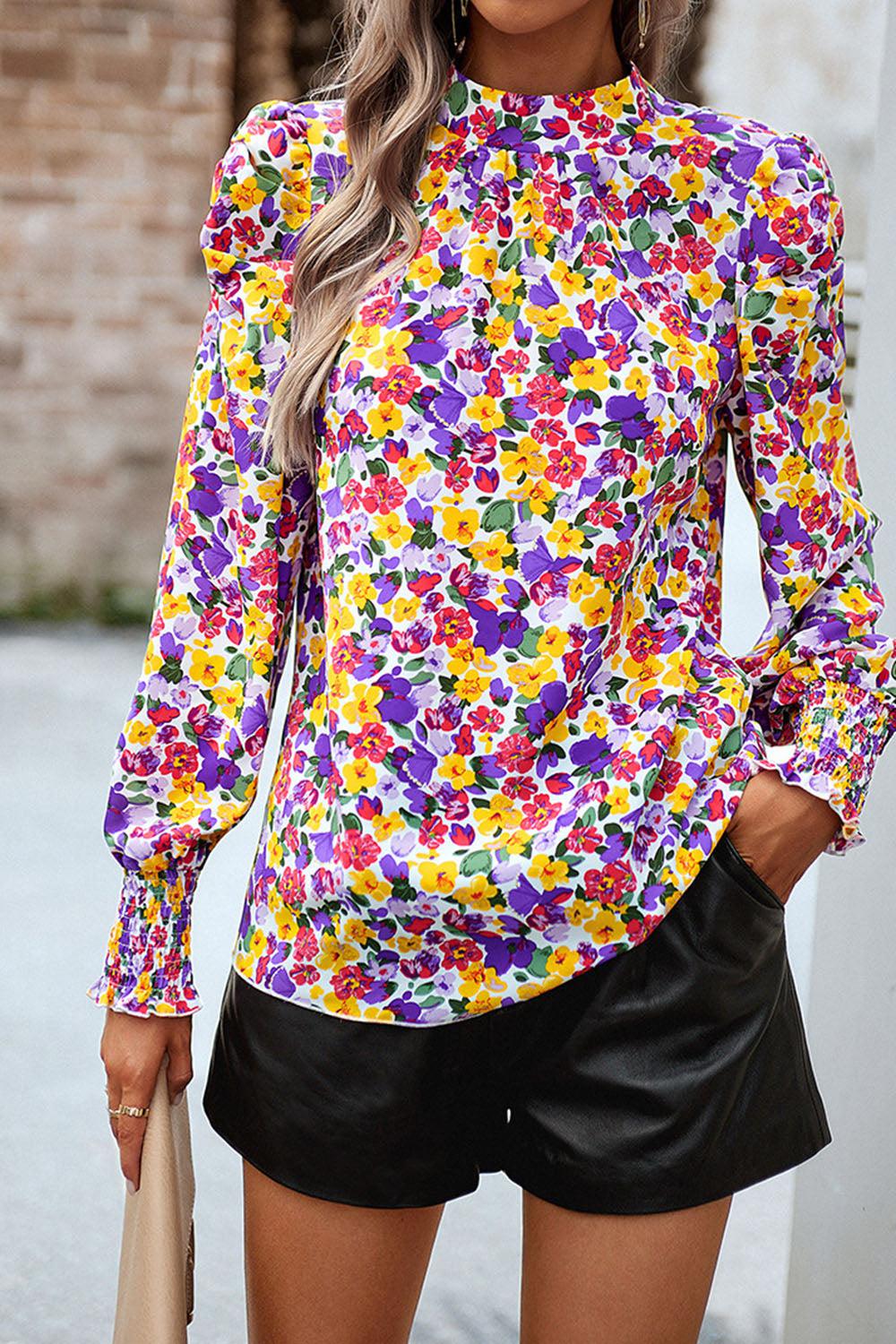 Bedruckte Bluse mit Smokdetails und Puffärmeln