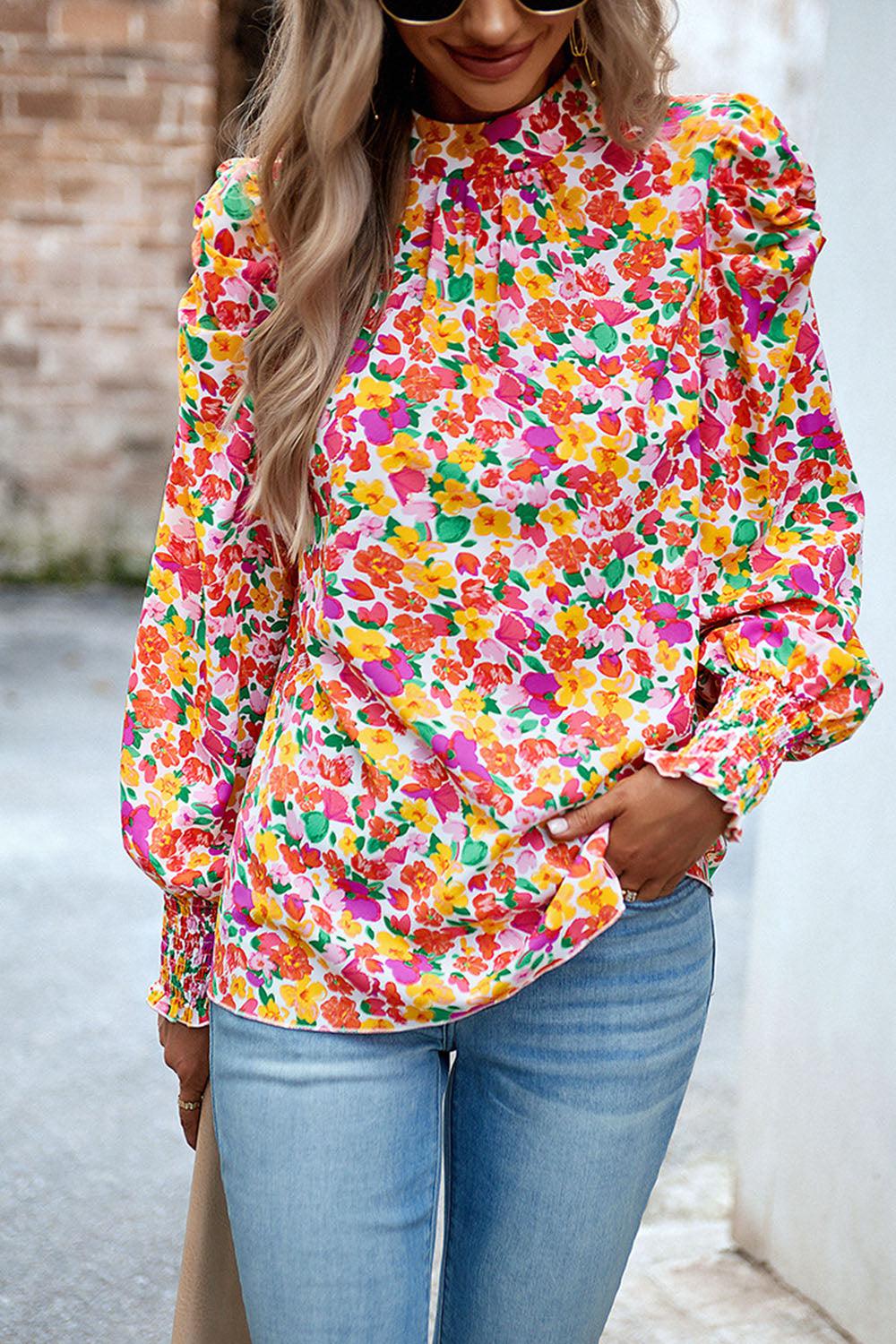 Bedruckte Bluse mit Smokdetails und Puffärmeln