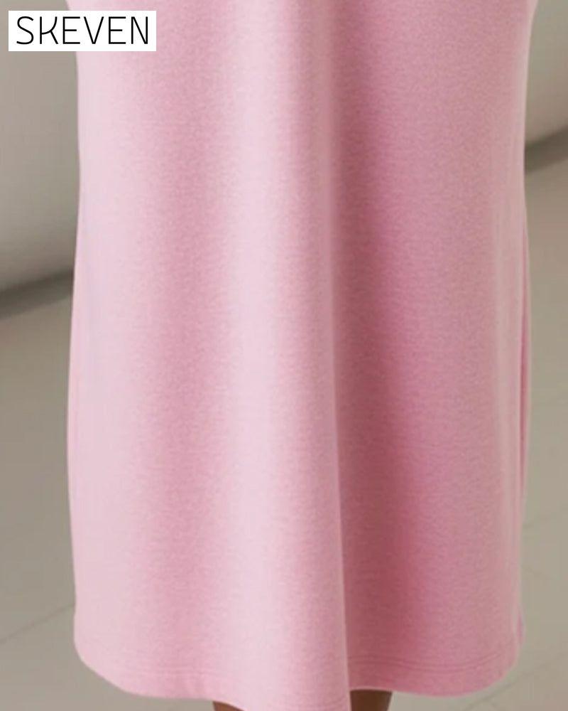 Langärmeliges, locker sitzendes Kapuzenkleid