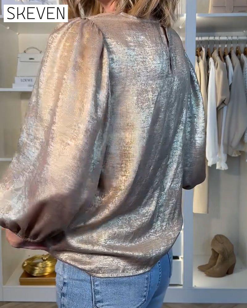 Chemisier tendance à manches bouffantes et col rond