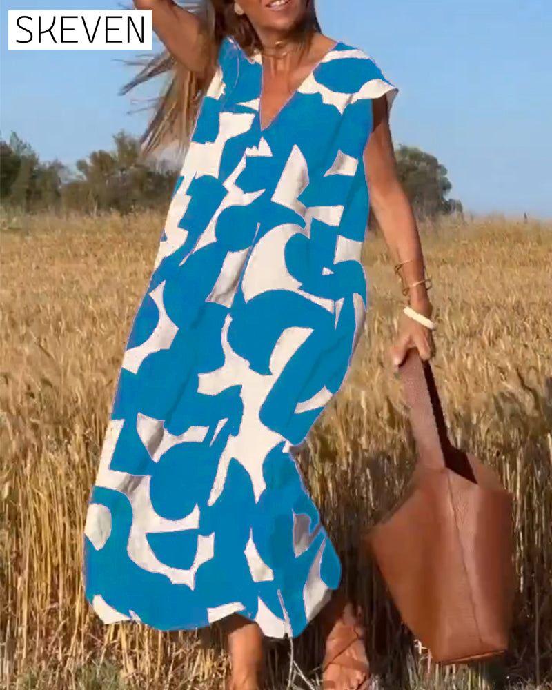 bedrucktes Kleid mit V-Ausschnitt