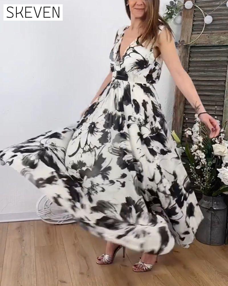 Ärmelloses, fließendes Kleid mit Blumenmuster