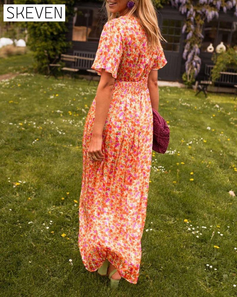 Blumenkleid mit V-Ausschnitt und Taille