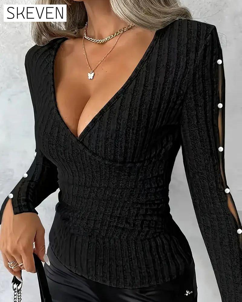 Sexy Stricktop mit V-Ausschnitt und Perlenärmeln
