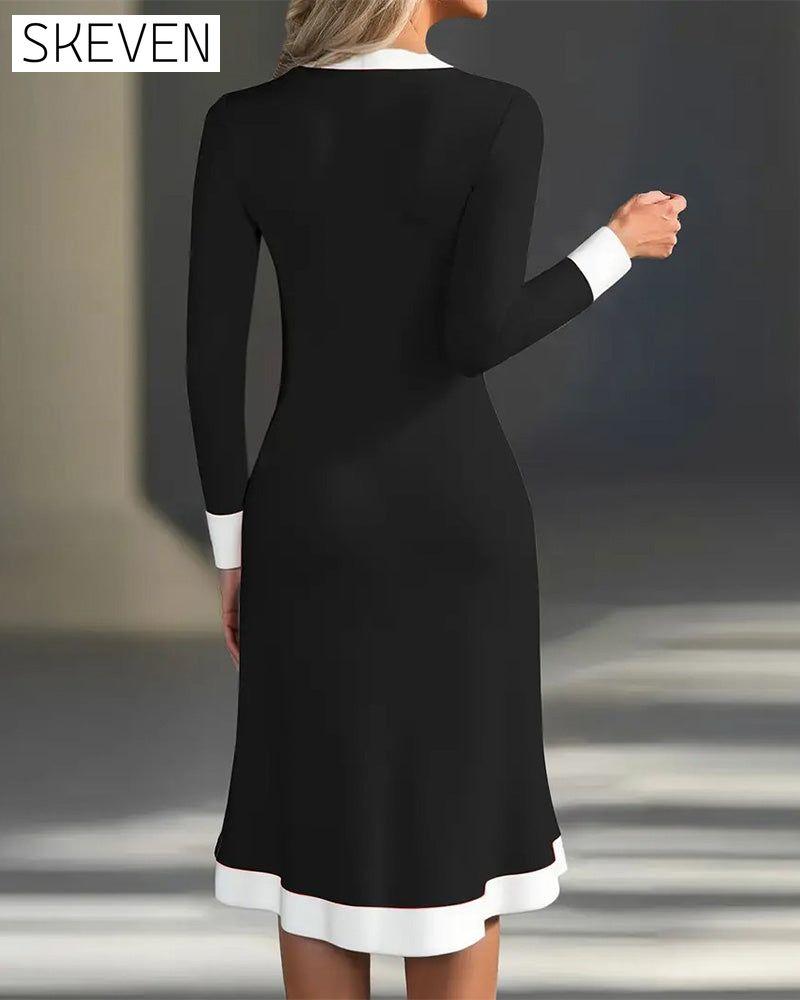 Robe élégante à manches longues et couleurs contrastées