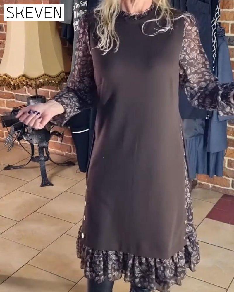 Kleid mit Rundhalsausschnitt und angedeutetem Zweiteiler