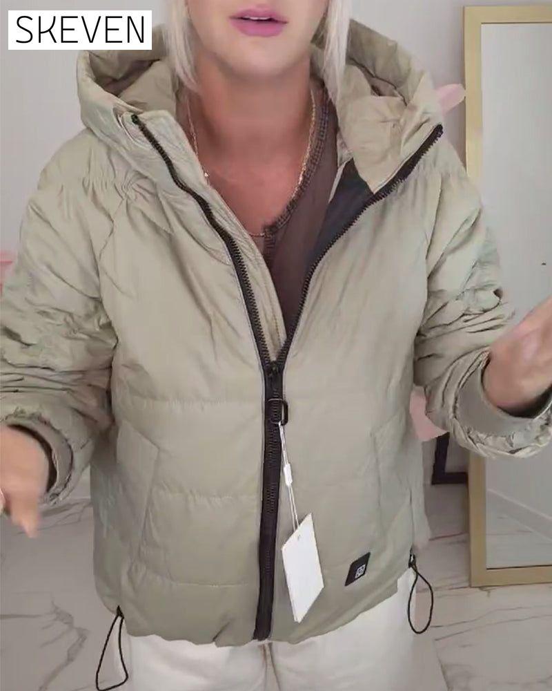 veste courte matelassée à capuche