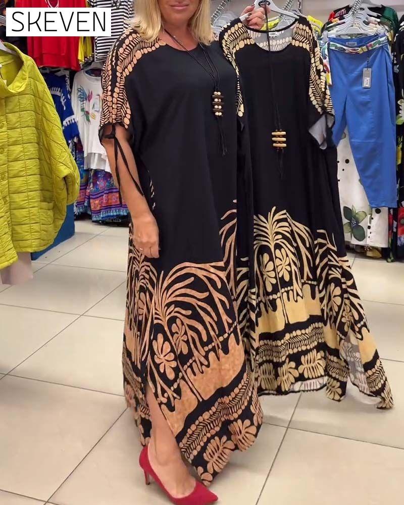 Bedrucktes, locker sitzendes Kleid mit Rundhalsausschnitt, kurzen Ärmeln und Schnürung
