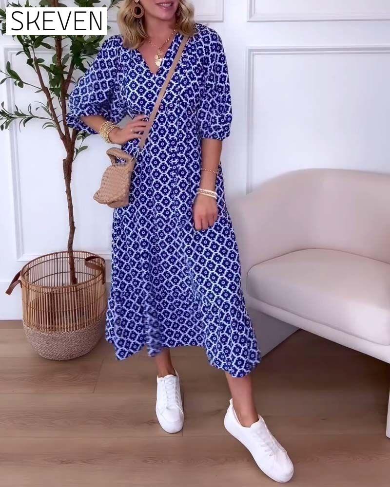 Lässiges bedrucktes Kleid mit V-Ausschnitt und Dreiviertelärmeln