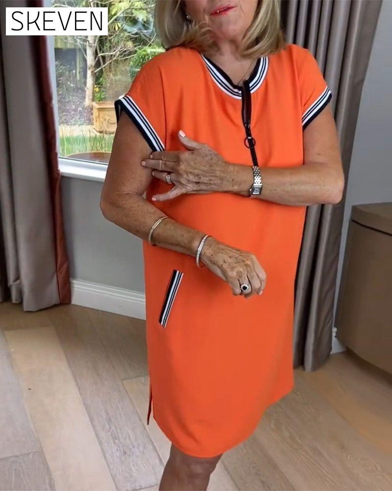 Sportkleid mit halbem Reißverschluss und Kontrastfarbe