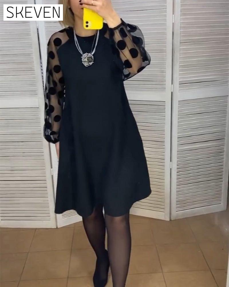 Elegantes Kleid mit Polka-Dot-Muster
