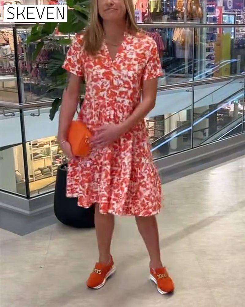 Kurzärmeliges geblümtes Midikleid