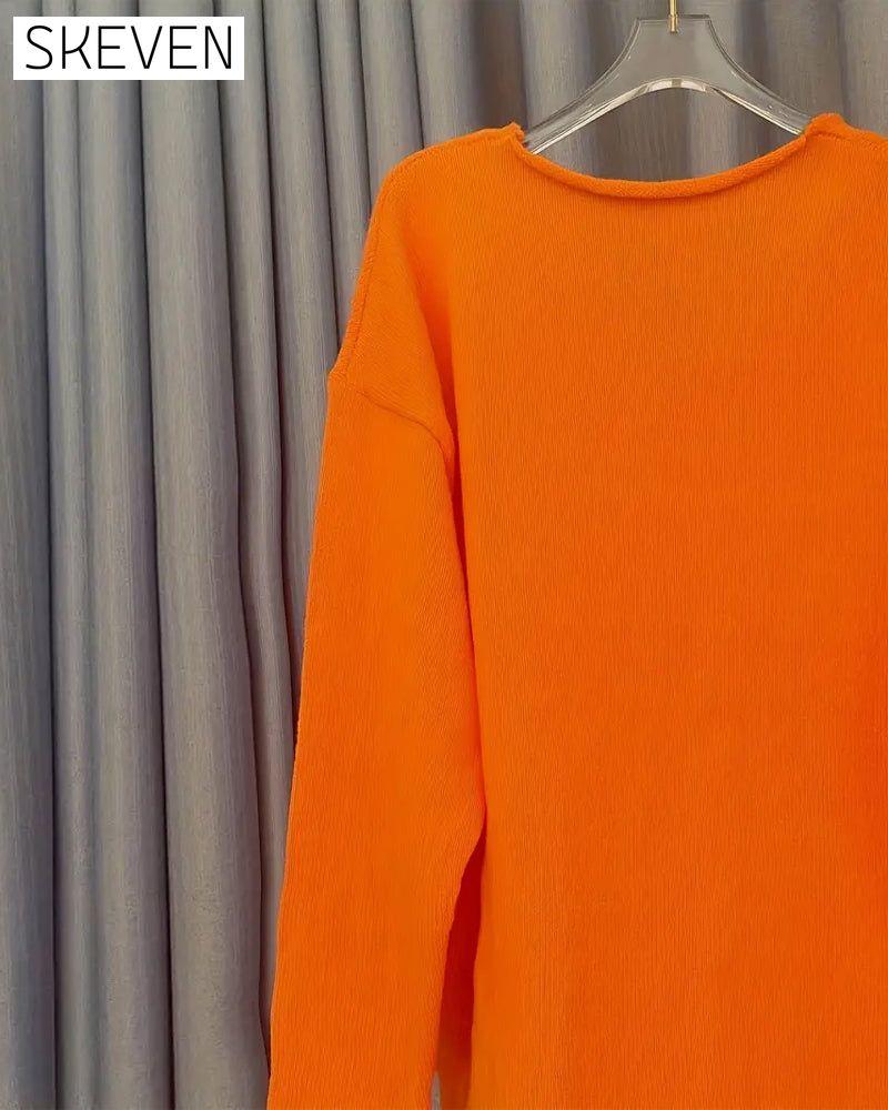 Lässiger Pullover mit V-Ausschnitt und Buchstabenprint