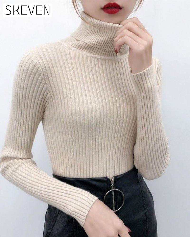 Hochgeschlossener Strickpullover als Basisschicht
