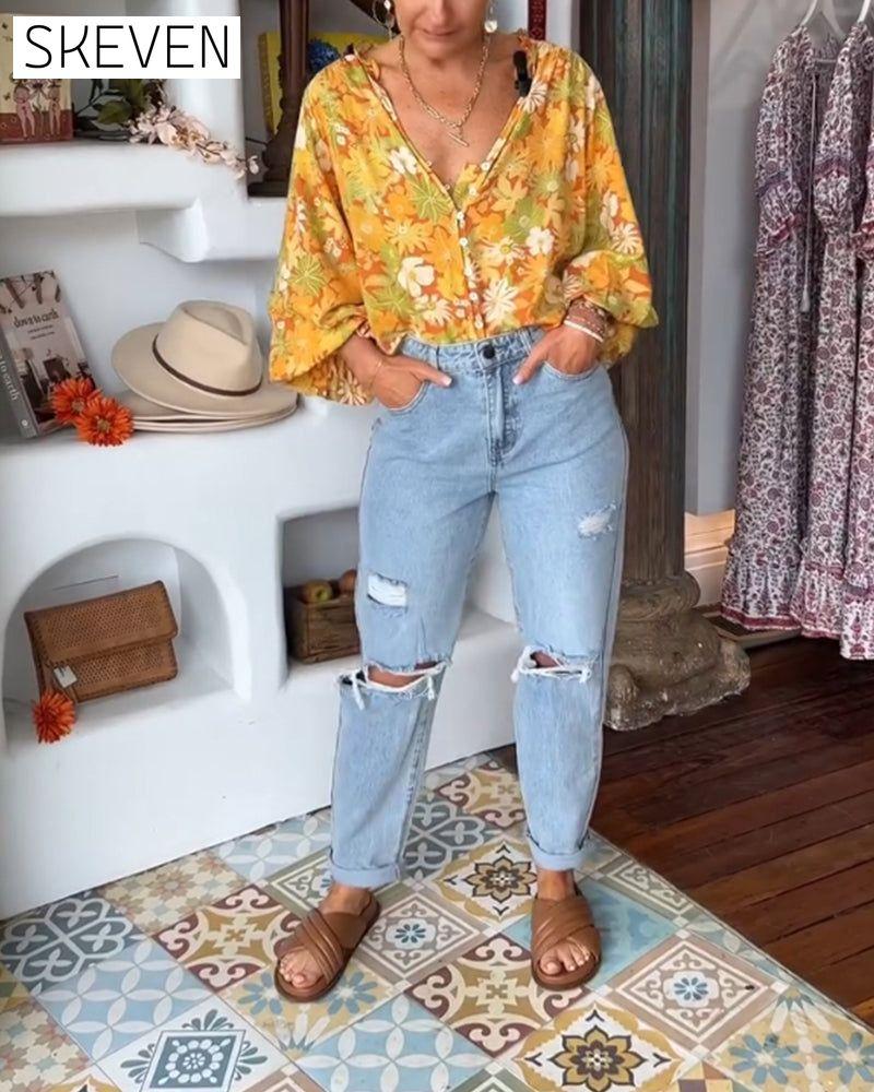 Bluse mit V-Ausschnitt und Blumenmuster
