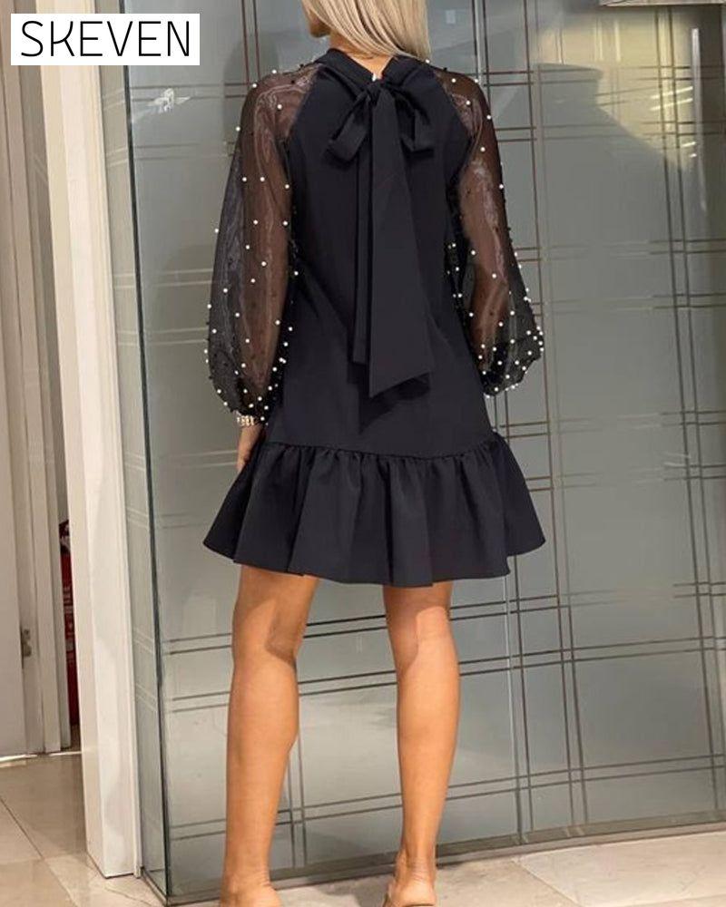 Einfarbiges, langärmeliges Kleid mit Schleife