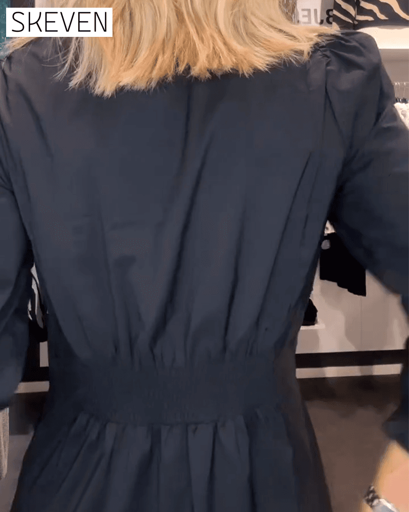Robe trapèze à manches bouffantes et taille haute