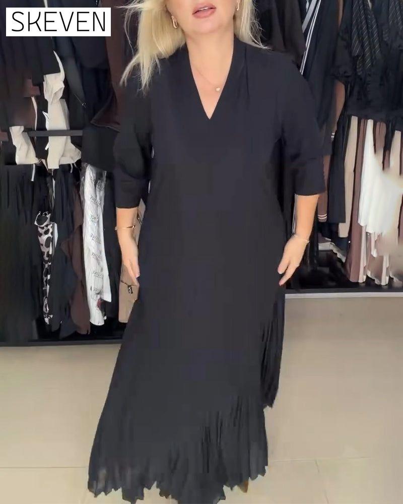 Elegantes langes Kleid mit Dreiviertelärmeln und V-Ausschnitt