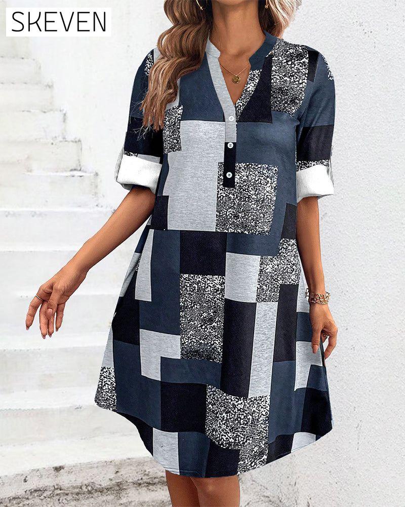 Kleid mit Karomuster und Knöpfen