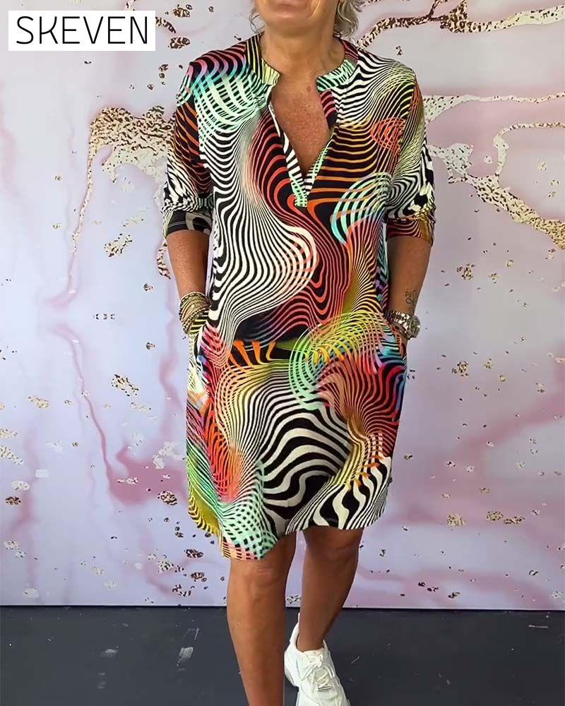 Colorful printed V-neck half-sleeve pocket dress