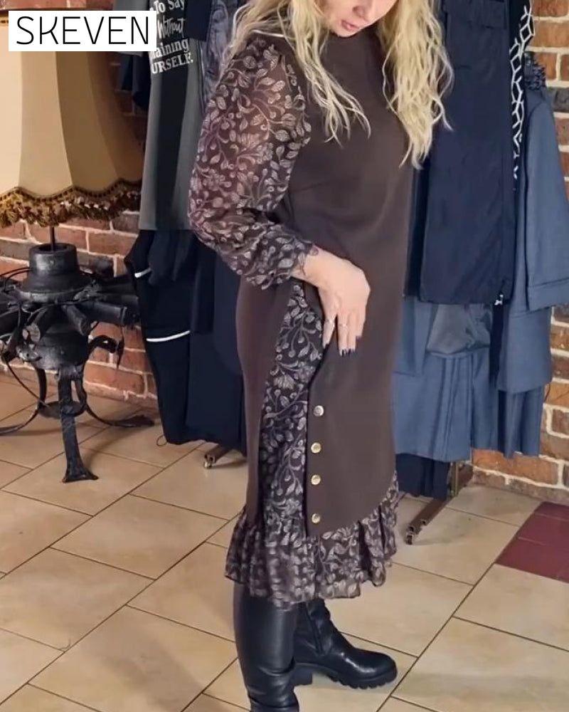 Kleid mit Rundhalsausschnitt und angedeutetem Zweiteiler