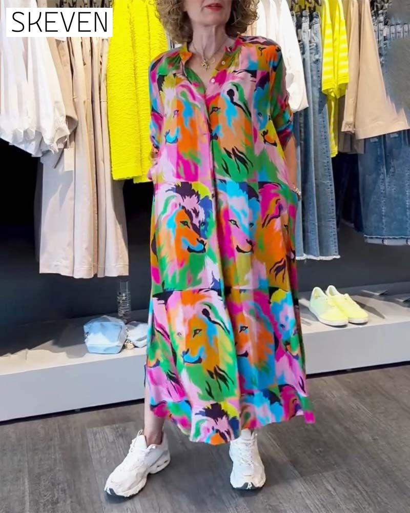 Kleid mit farbigem Aufdruck und Taschen