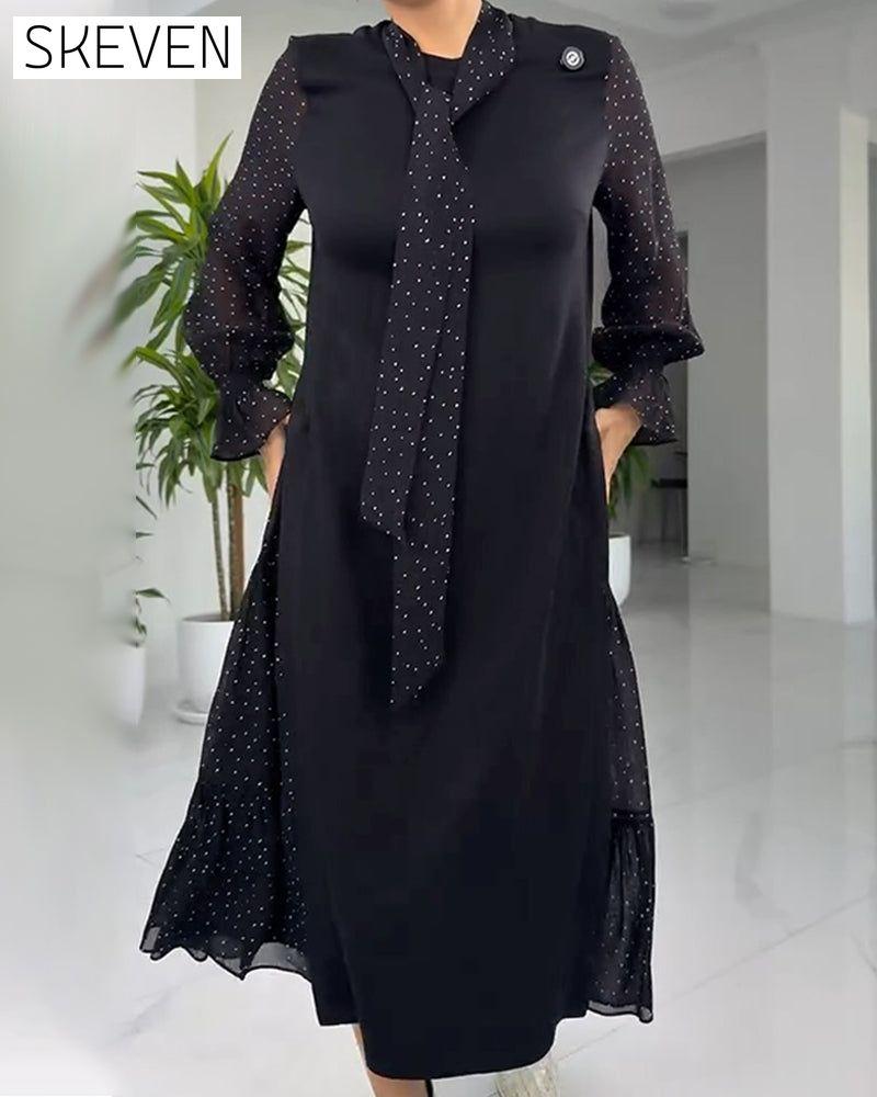 Zweiteiliges Kleid aus Kunstspitze mit Patchworkmuster