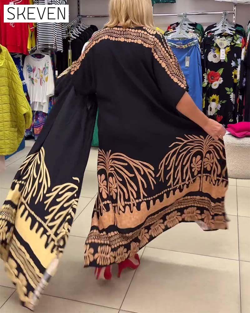 Bedrucktes, locker sitzendes Kleid mit Rundhalsausschnitt, kurzen Ärmeln und Schnürung