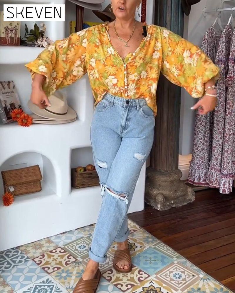 Bluse mit V-Ausschnitt und Blumenmuster
