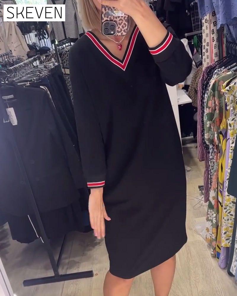 Robe élégante à col en V avec poches