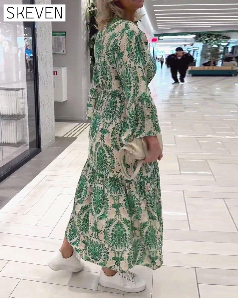 Bedrucktes Kleid mit Glockenärmeln und Kordelzug