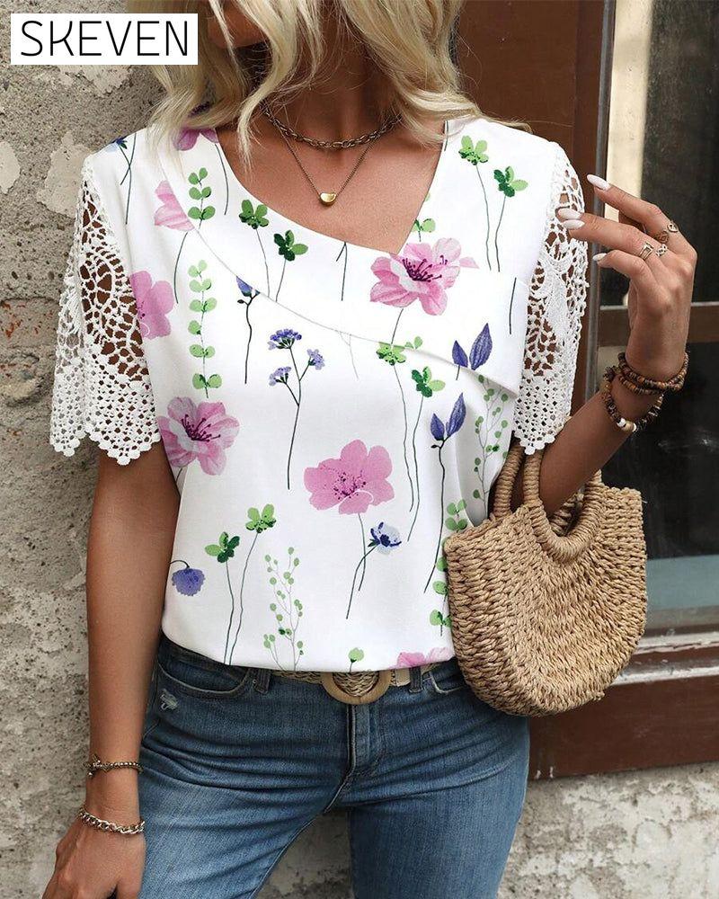 Bedruckte Bluse mit Spitzenbesatz