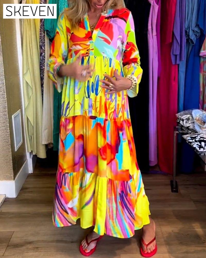 Bedrucktes Kleid mit ausgestellten Ärmeln