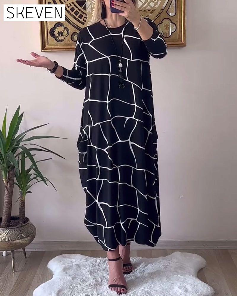 Robe ample à manches longues et col rond avec poches