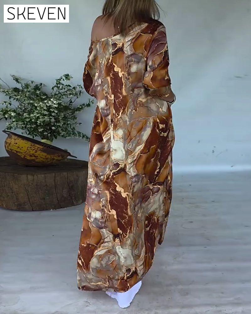 Modische Bluse mit Schlitz und Print