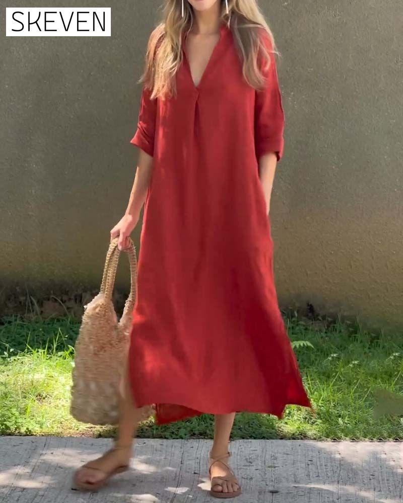 Bequemes, einfarbiges Kleid mit V-Ausschnitt und Tasche