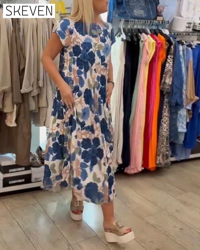 Elegantes Kleid mit Rundhalsausschnitt und Blumenmuster