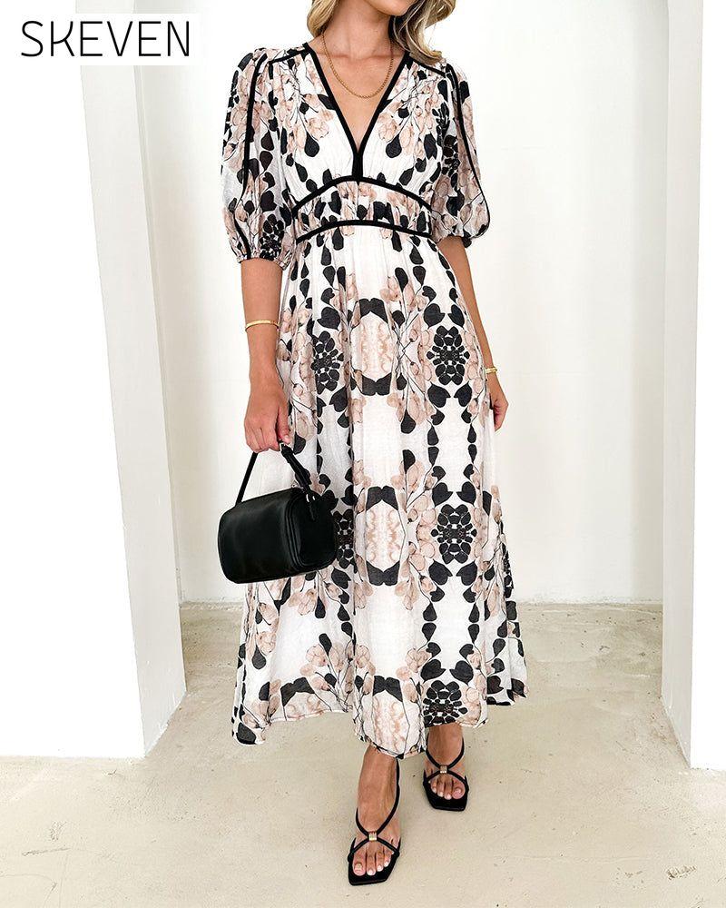 Robe longue élégante à manches bouffantes et imprimé