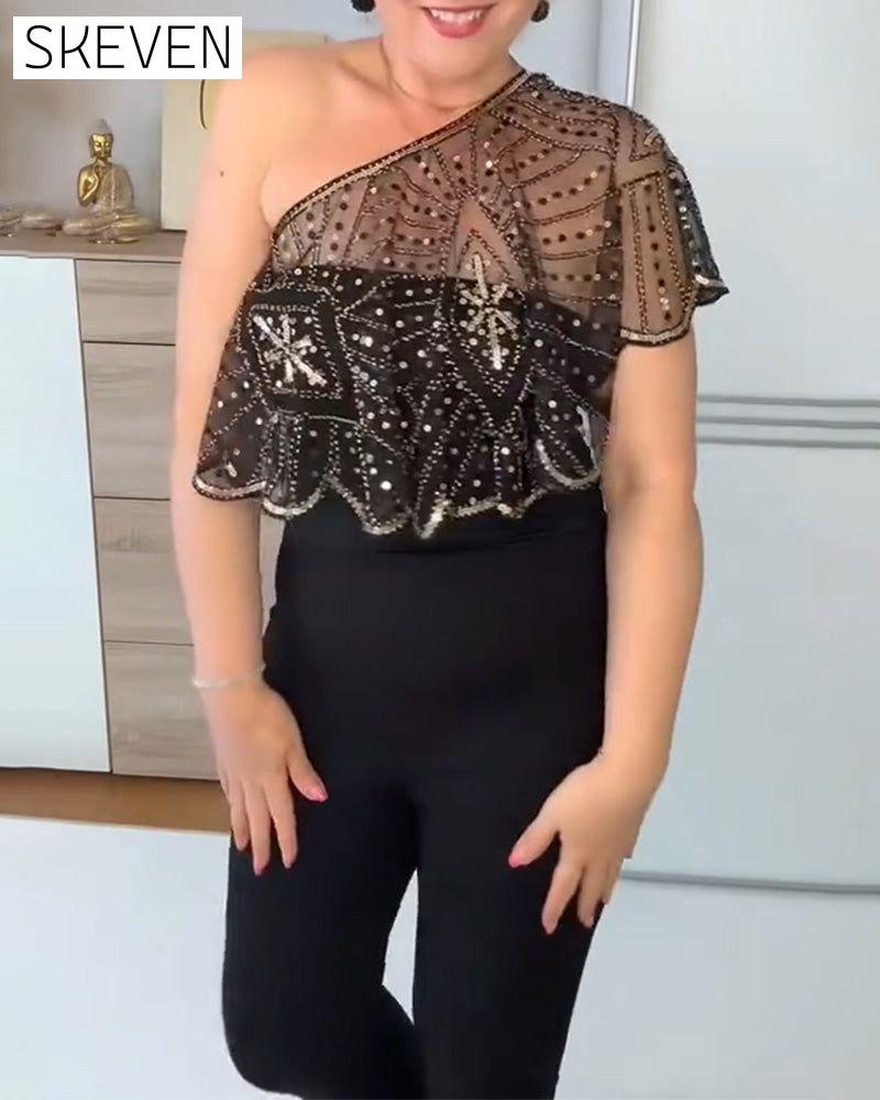 Châle vintage en dentelle orné de perles
