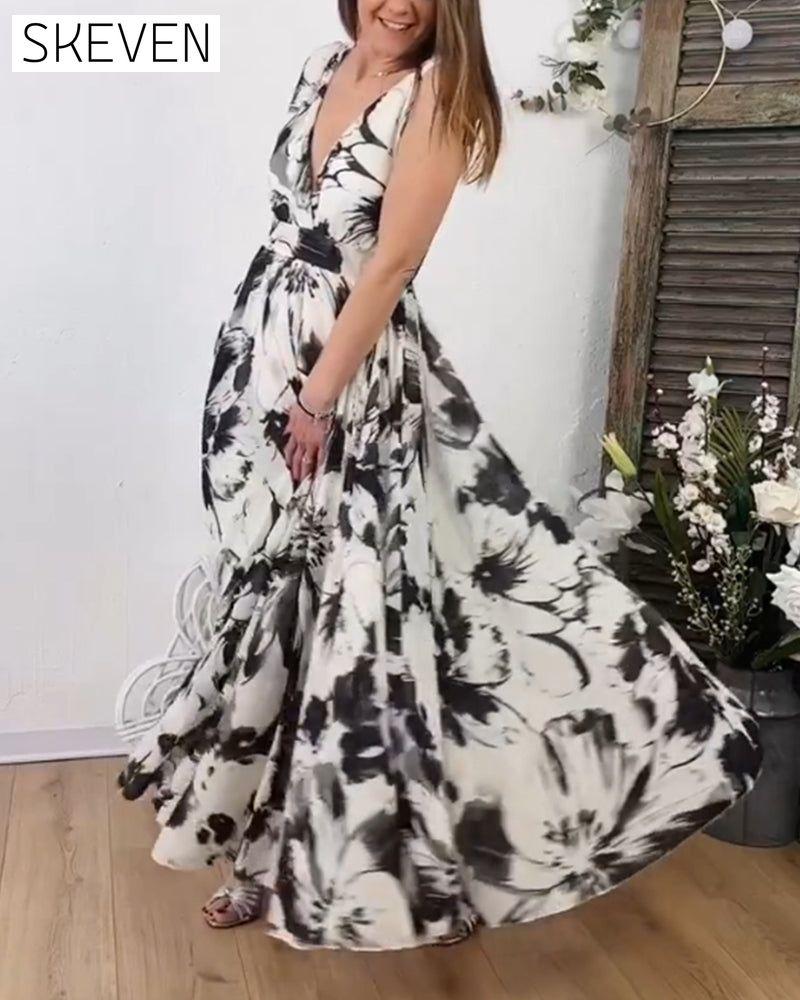 Ärmelloses, fließendes Kleid mit Blumenmuster
