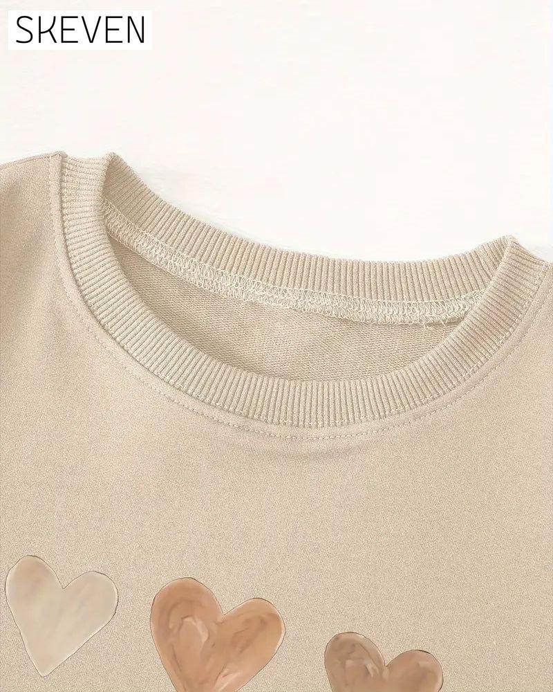 Bunter herzförmiger Pullover
