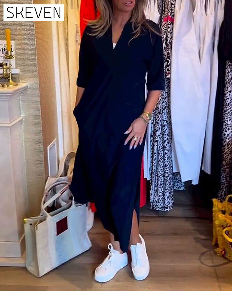 Kleid mit V-Ausschnitt und Taschen