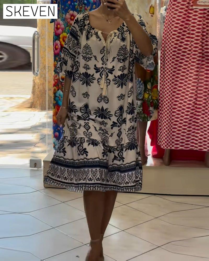 Kurzarmkleid mit Rundhalsausschnitt, bedruckt, Trompetenform, kurz geschnitten